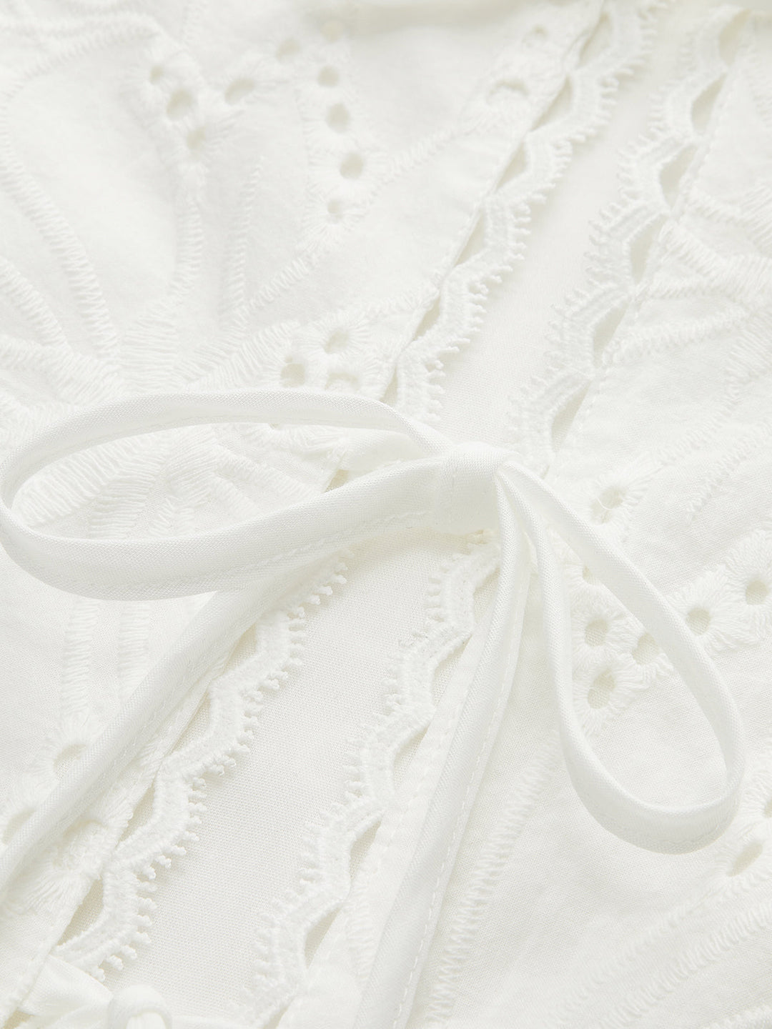 Sleeveless Eyelet Lace-Up Crop Top